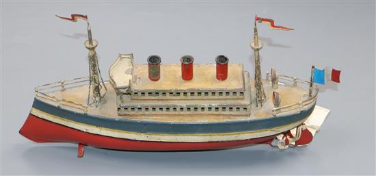 A rare early 1900s tinplate three funnelled clockwork powered ocean liner probably by Fleischmann for Carette